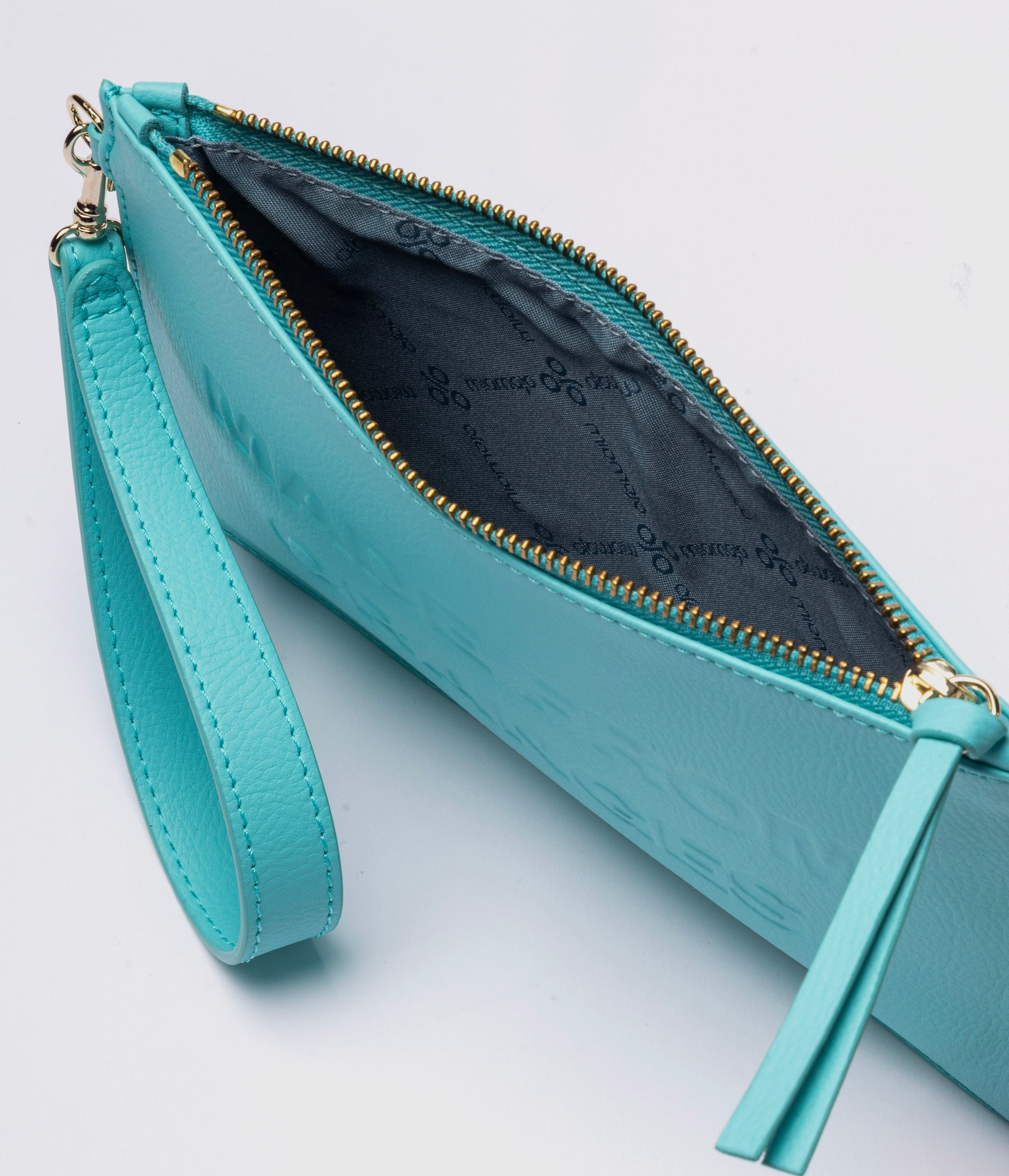 Orion Pouch – Acquamarina (a base di arance)