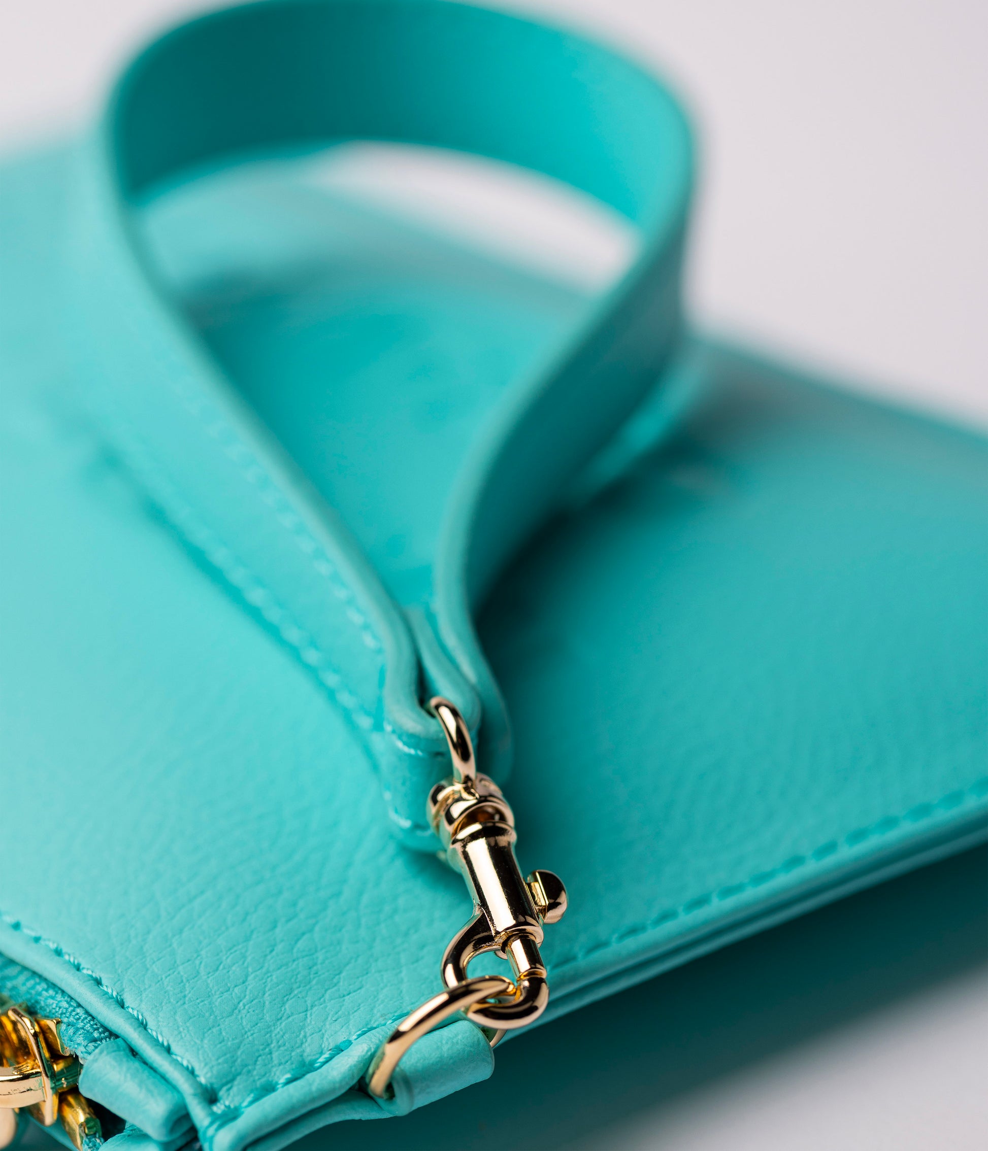 Orion Pouch – Acquamarina (a base di arance)