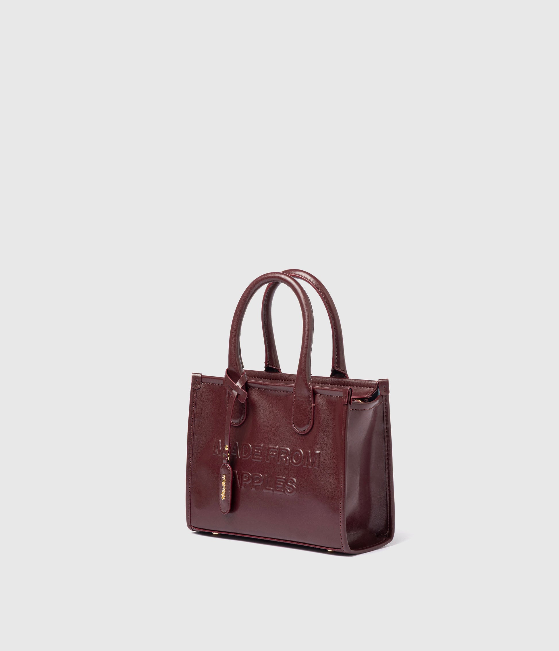 Alima Deluxe Tote M - Rubino (a base di mela)